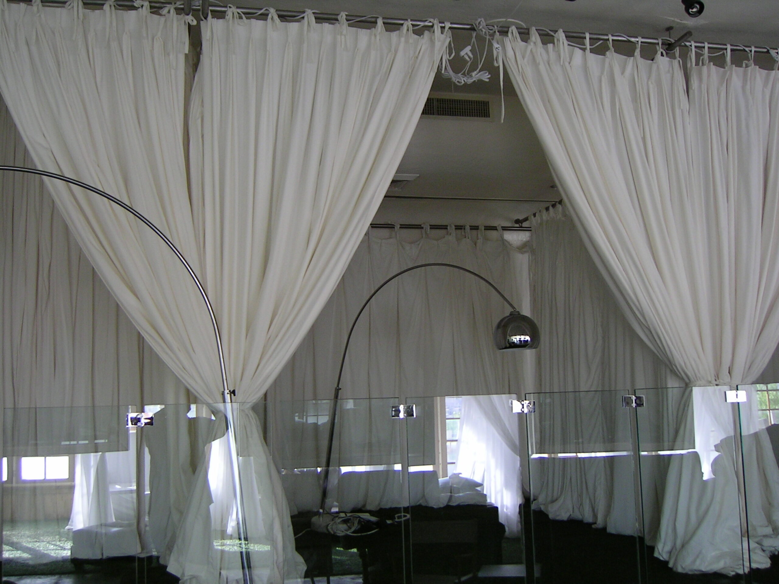 Spaces with white curtains