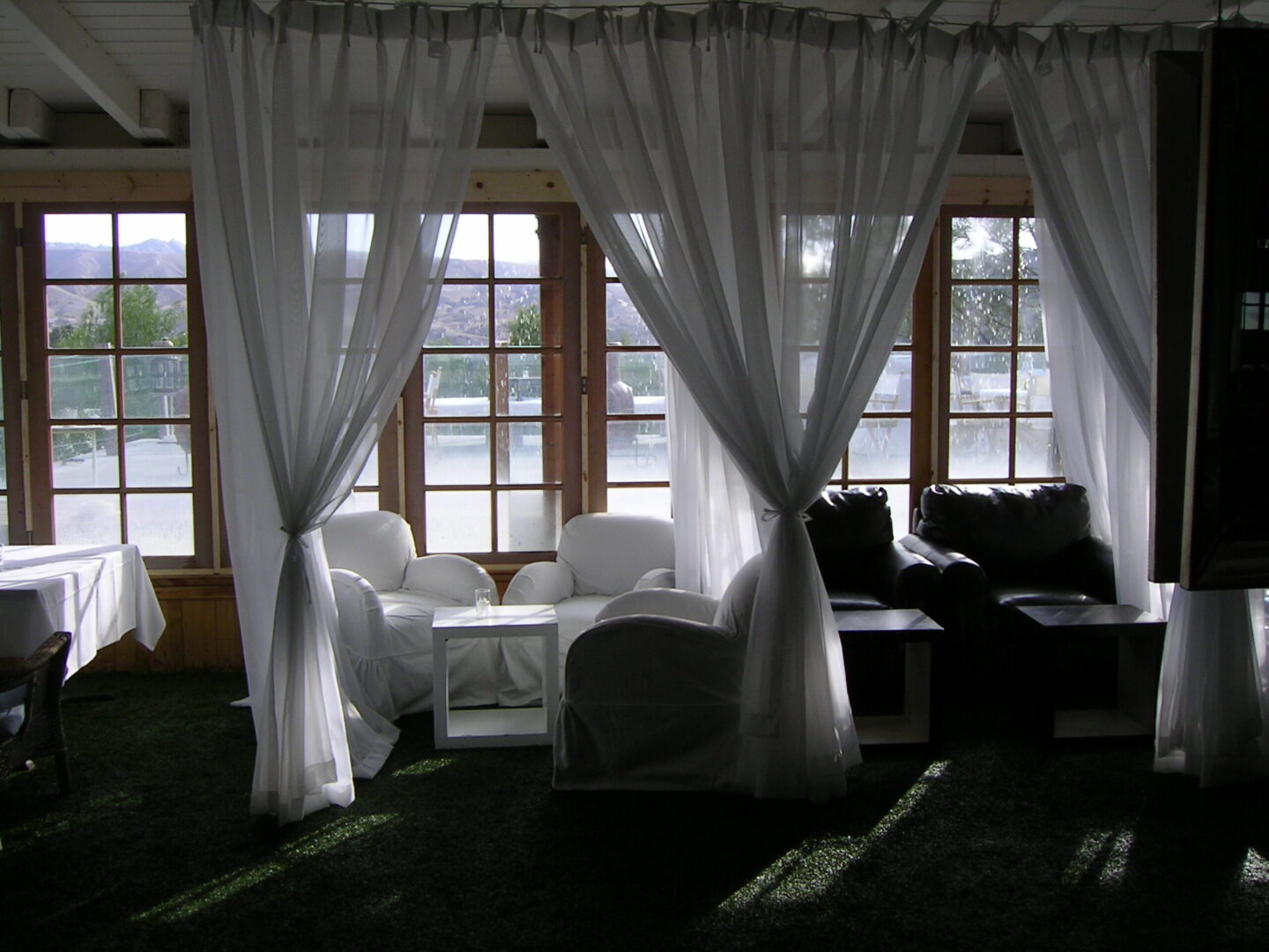 A lounge with curtains